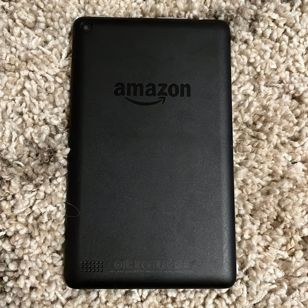 Amazon fire tablet, No cracks and works well. (NOT INCLUDING CHARGER)
